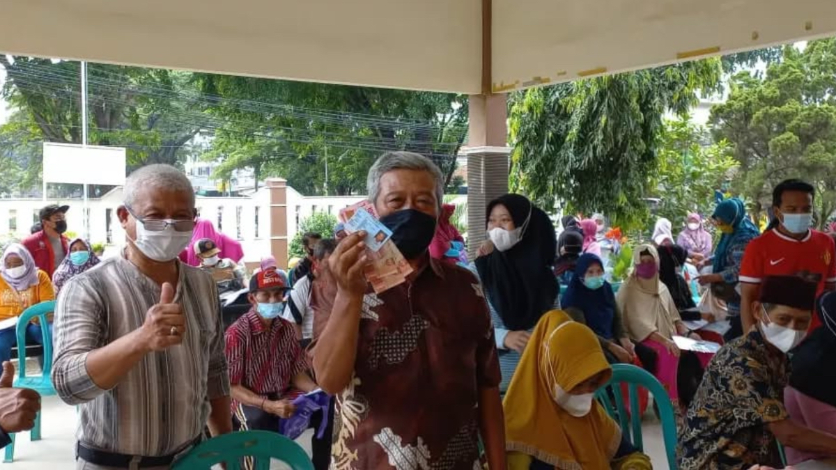 Ilustrasi penyaluran bansos PKH BPNT.