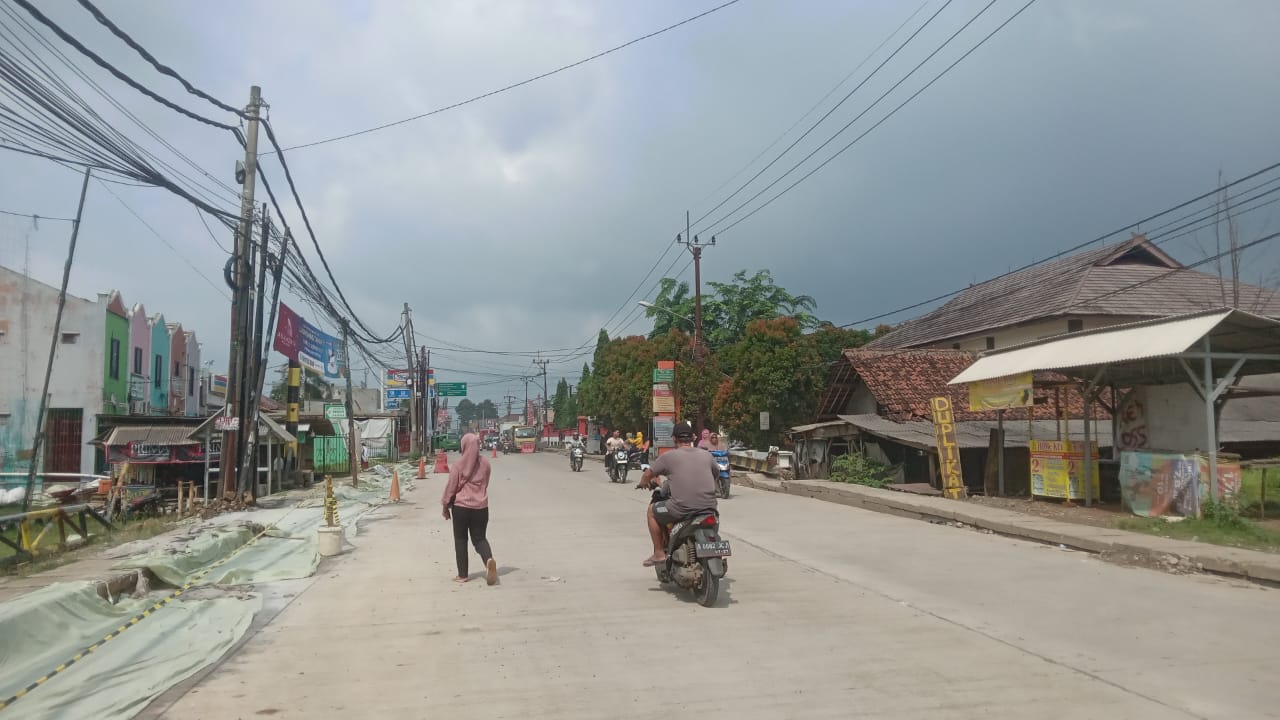 Perbaikan jalan provinsi di Jalan Moh Toha, Kecamatan Parung Panjang, Kabupaten Bogor, telah mencapai 94 persen.