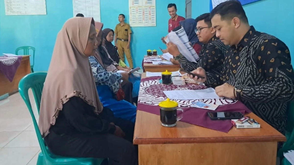 Ilustrasi. Penyaluran bansos BPNT ke KPM.