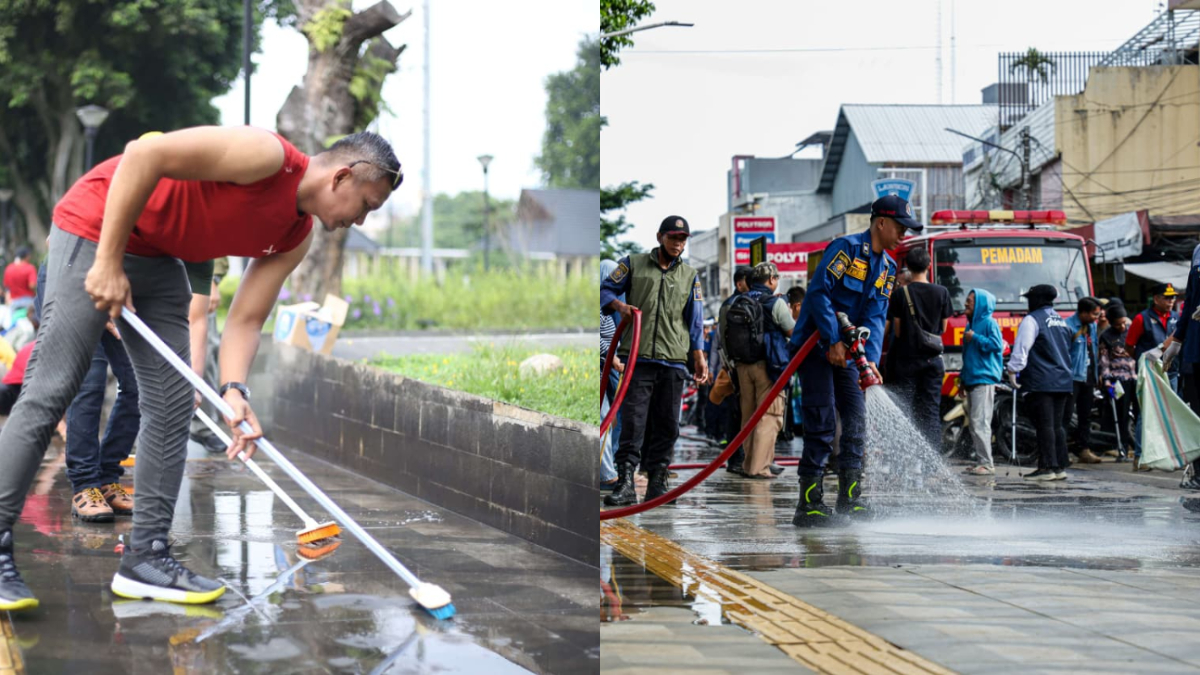Wakil Wali Kota Bogor Jenal Mutaqin dan petugas Damkar membersihkan pendestrian Alun-alun Kota Bogor.