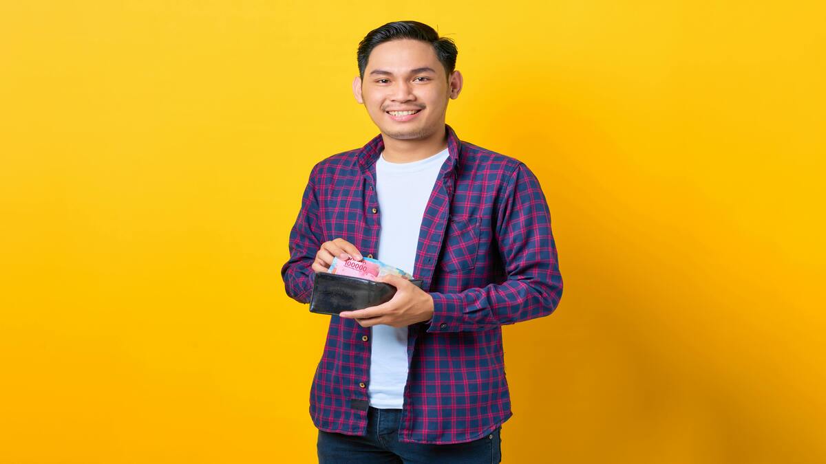 Ilustrasi guru mencairkan TPG tahun 2026.