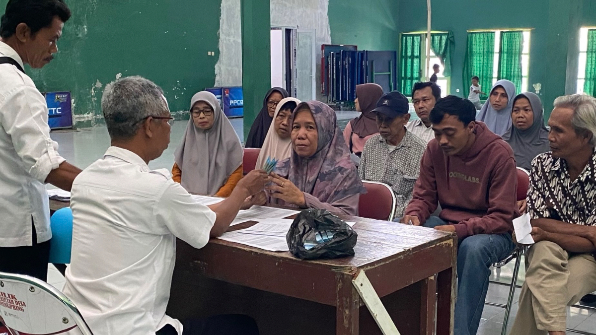 Ilustrasi penyaluran bansos kepada KPM di tahun 2026.