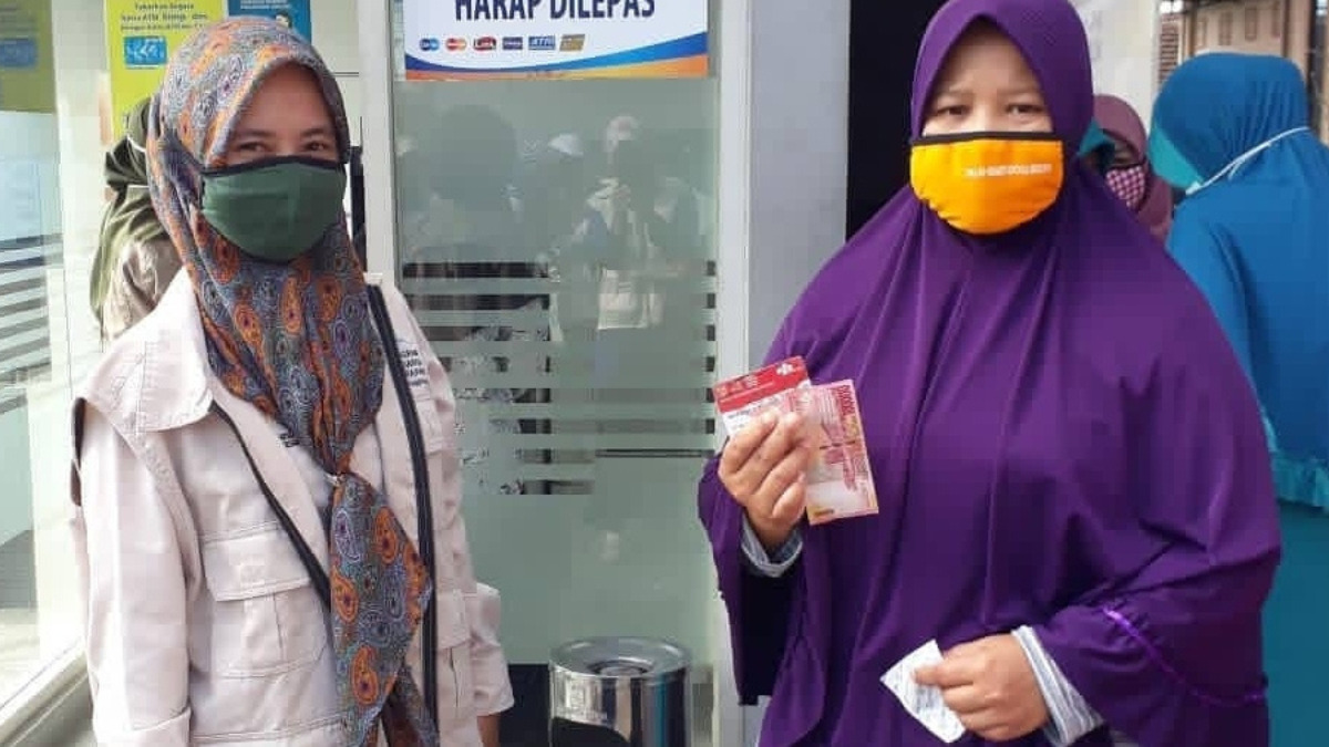 Ilustrasi pencairan bansos PKH BPNT double.