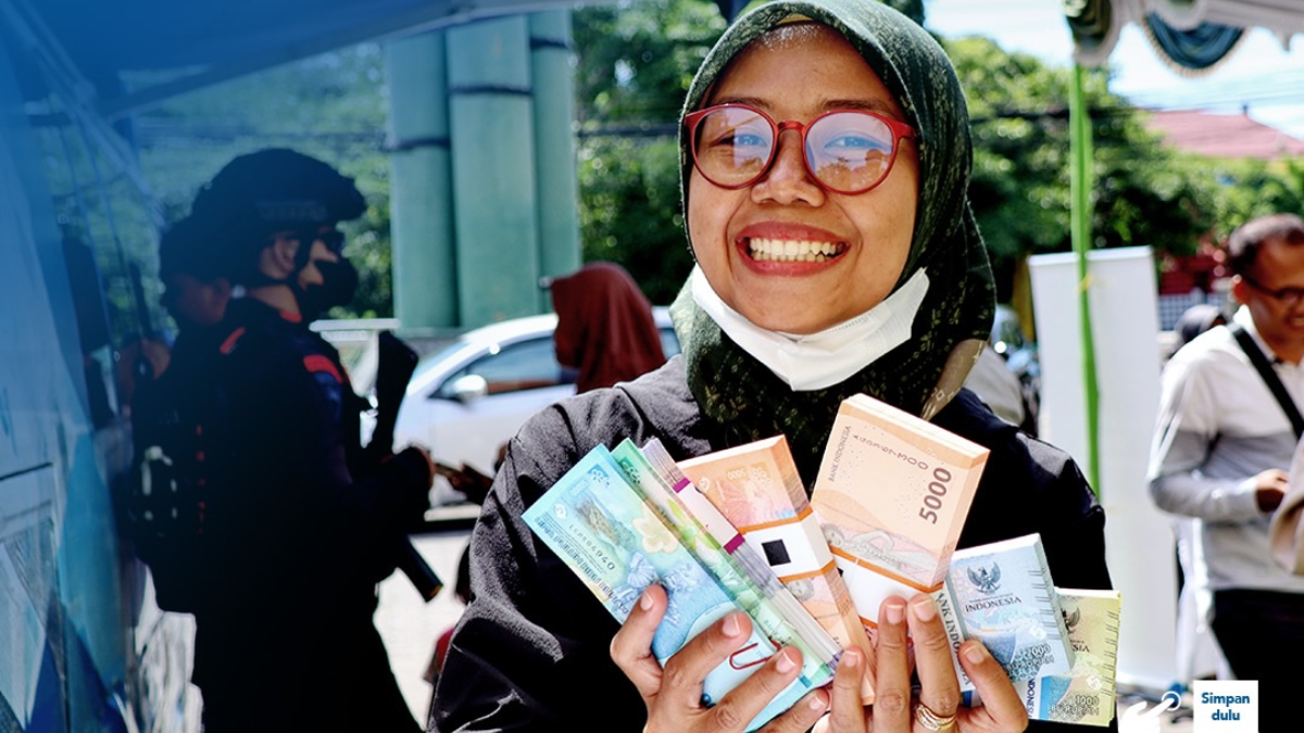Ilustrasi masyarakat yang berhasil menukar uang di Bank Indonesia