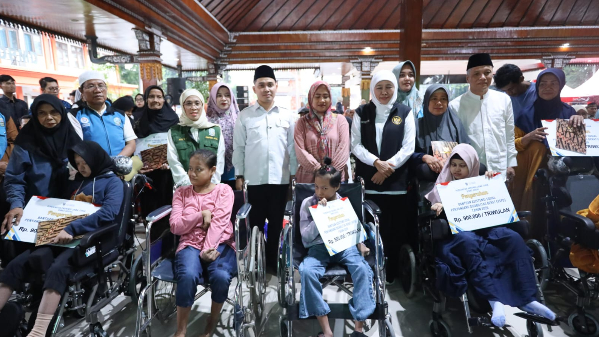 Ilustrasi penyaluran bansos kepada Keluarga Penerima Manfaat (KPM)