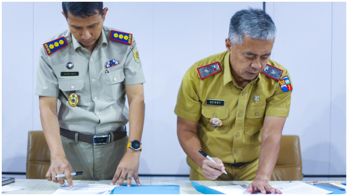 Penanda tanganan berita acara pembayaran pengadaan tanah untuk proyek Tol BORR Seksi III B 