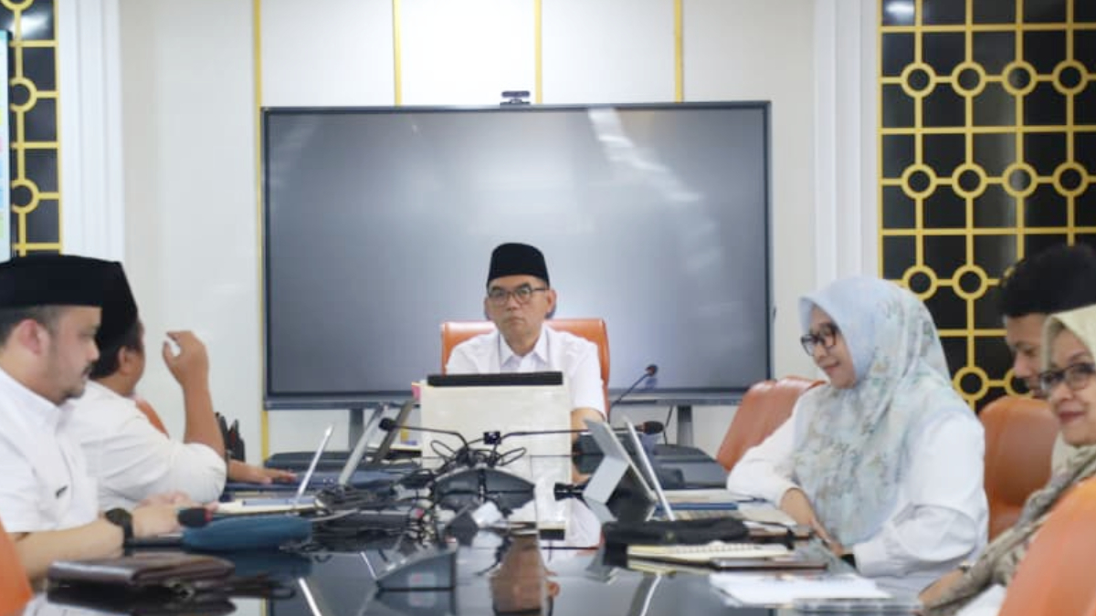 Sekretaris Daerah Kabupaten Bogor, Ajat Rochmat Jatnika saat mengikuti launching TP2DD atau ETPD di Cibinong, Kabupaten Bogor, Rabu, 4 Maret 2026.