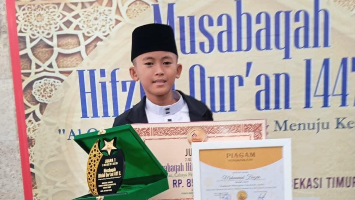 Siswa SDN Citeureup 06, Muhamad Fauzan meraih juara 1 MHQ 2 Juz di Bekasi Timur, Kota Bekasi. 