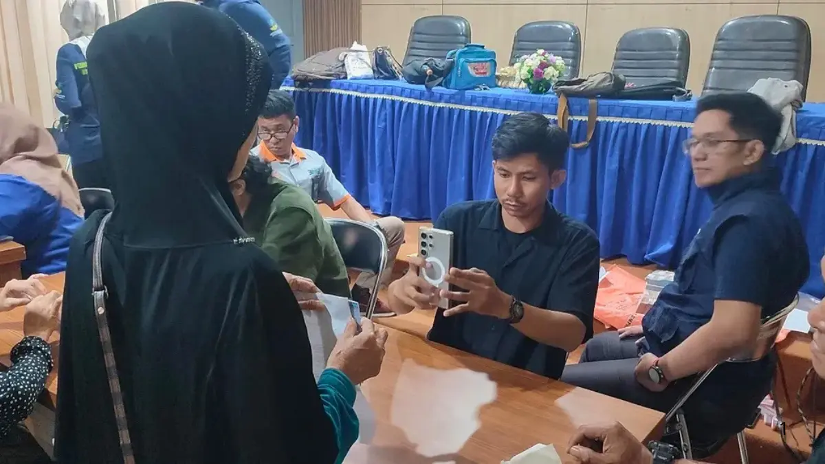 Ilustrasi penyaluran bansos PKH di salah satu wilayah. (Foto: barat.banjarmasinkota.go.id)