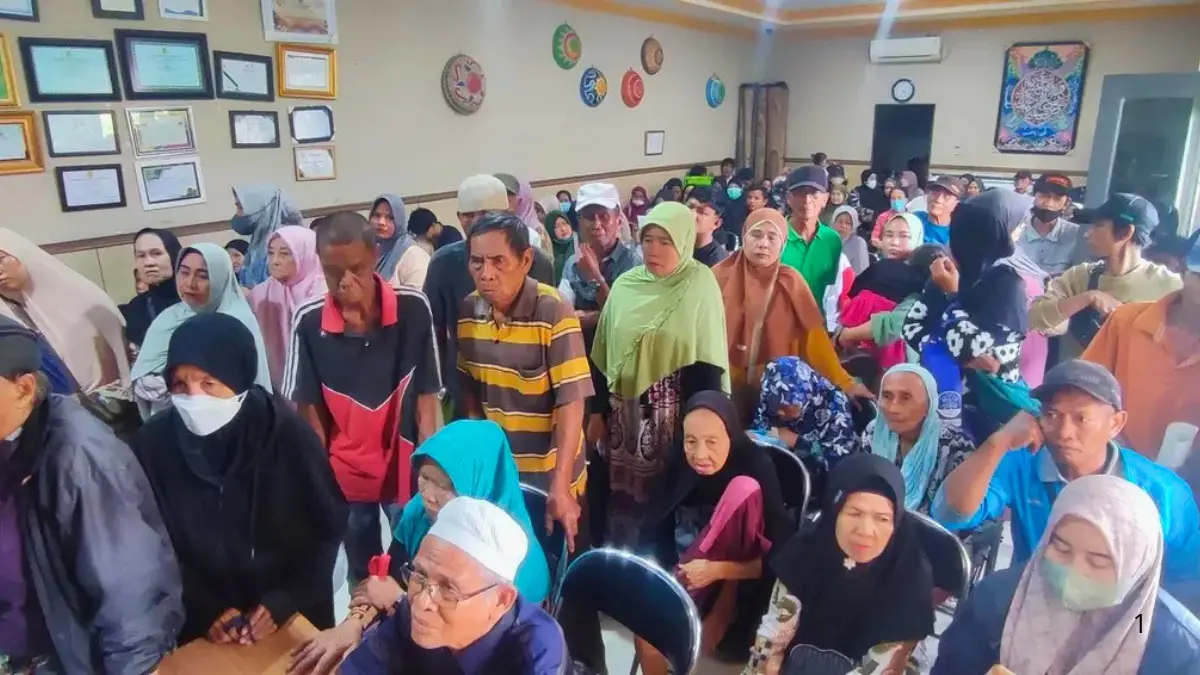 Ilustrasi proses penyaluran bansos jadi bukti kepedulian negara kepada rakyat. (Foto: barat.banjarmasinkota.go.id)
