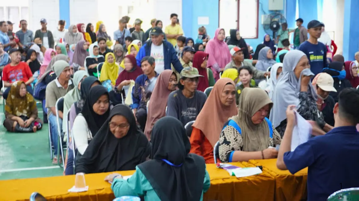 Antusiasme warga saat penyaluran PKH dan BPNT berlangsung (Foto: selatan.banjarmasinkota.go.id)