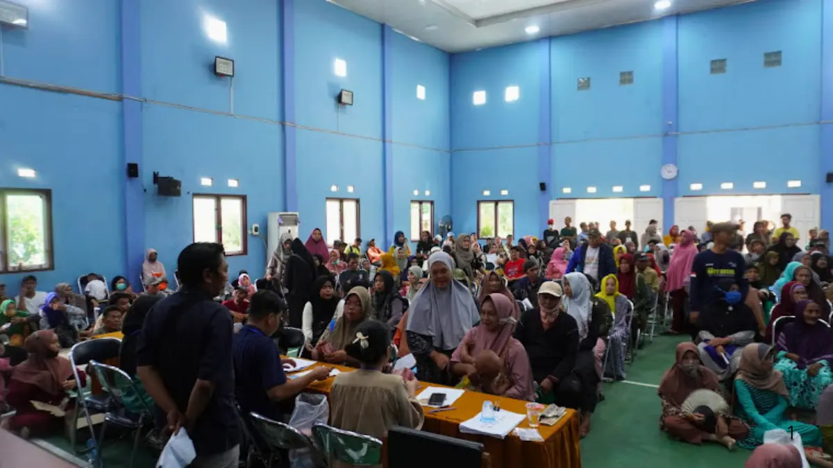 Pelaksanaan pembagian bansos PKH dan BPNT berjalan secara tertib dan lancar (Foto: selatan.banjarmasinkota.go.id)