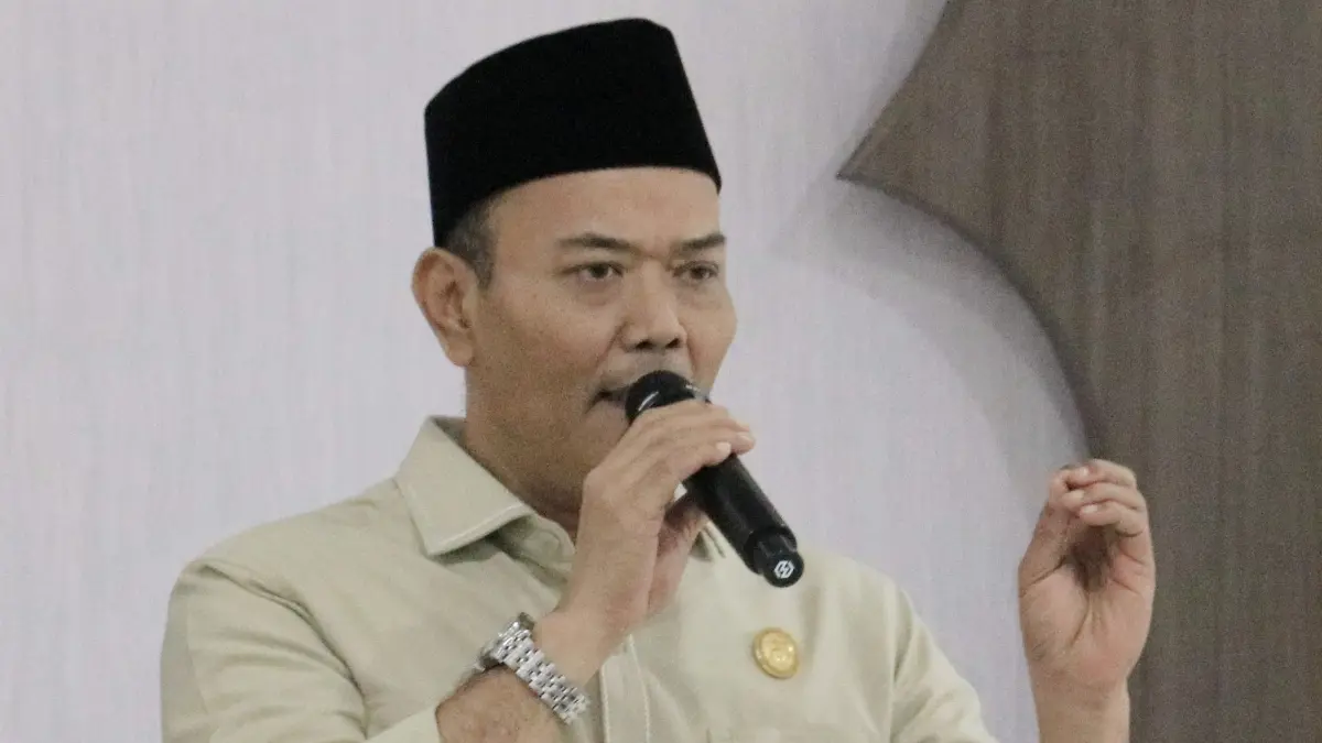 Kepala Kemenag Kabupaten Bogor Raden Enjat Mujiat menyampaikan terkait pengelolaan zakat. (Dok. Kemenag Kabupaten Bogor)