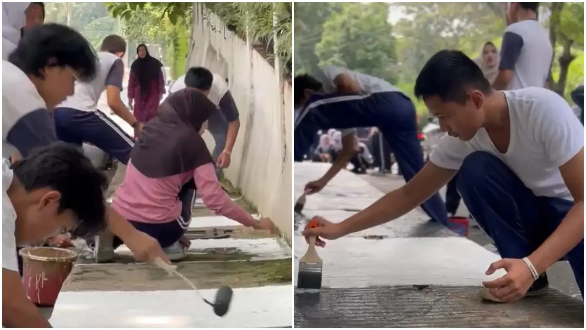 Siswa dan siswi SMAN 4 Kota Bogor saat mengecet trotoar. (Dok. SMAN 4 Kota Bogor)