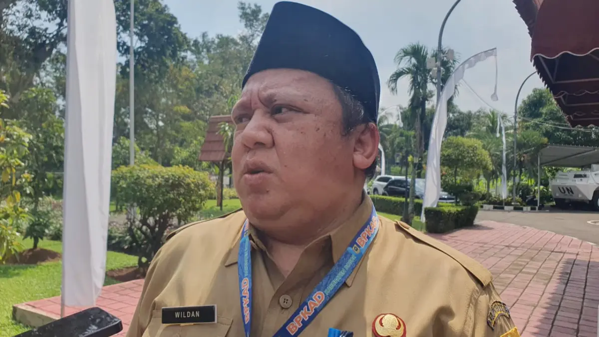 Plt BPKAD Kabupaten Bogor Achmad Wildan saat menyampaikan keterangan. (Billy/Radar Bogor)