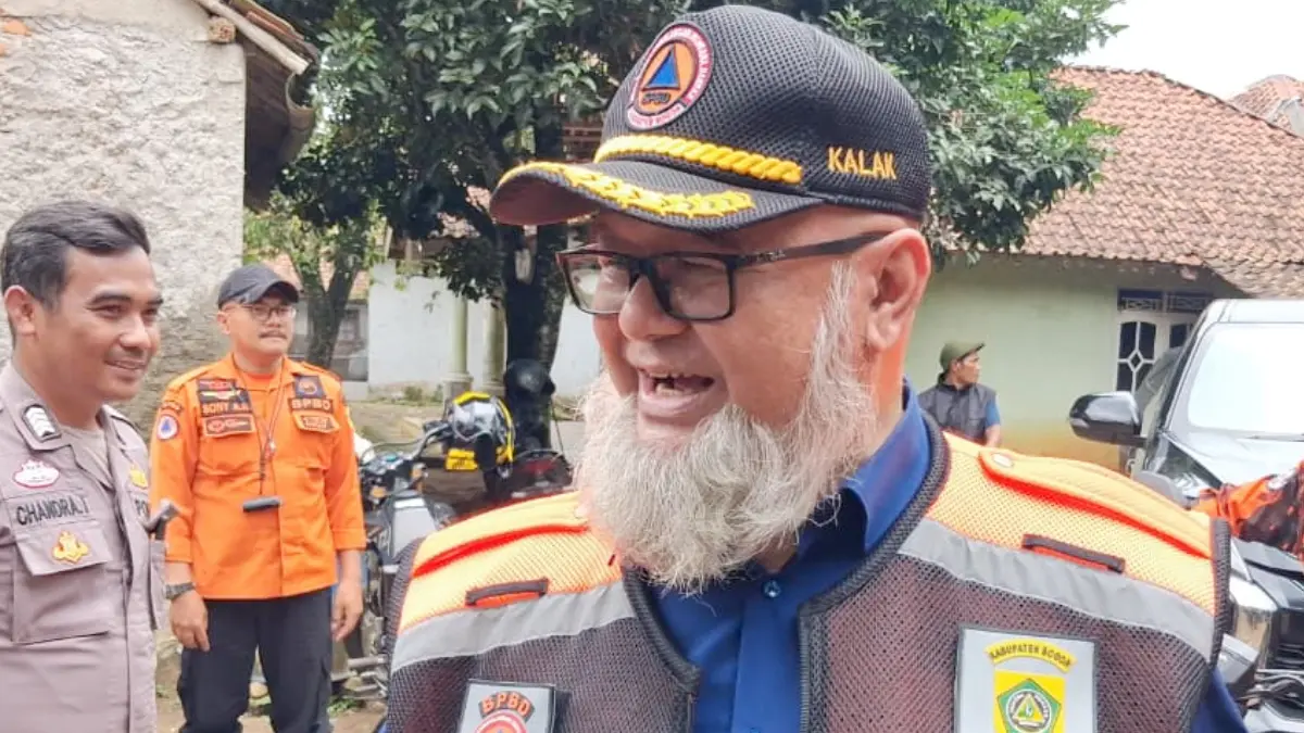 Kepala Pelaksana (Kalak) BPBD Kabupaten Bogor, Ade Hasrat saat dimintai keterangan oleh Radar Bogor. (Muhammad Ali/Radar Bogor)