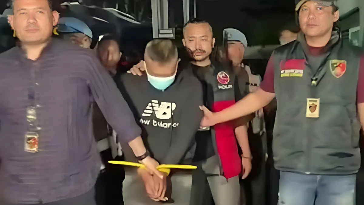 Taufik Hidayat digiring petugas Polda Jawa Barat.