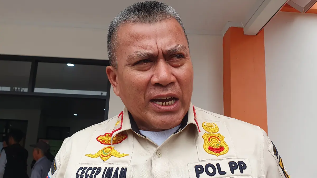 Kepala Satpol PP Kabupaten Bogor Cecep Imam Nagarasid saat menyampaikan keterangan. (Dok. Radar Bogor) 