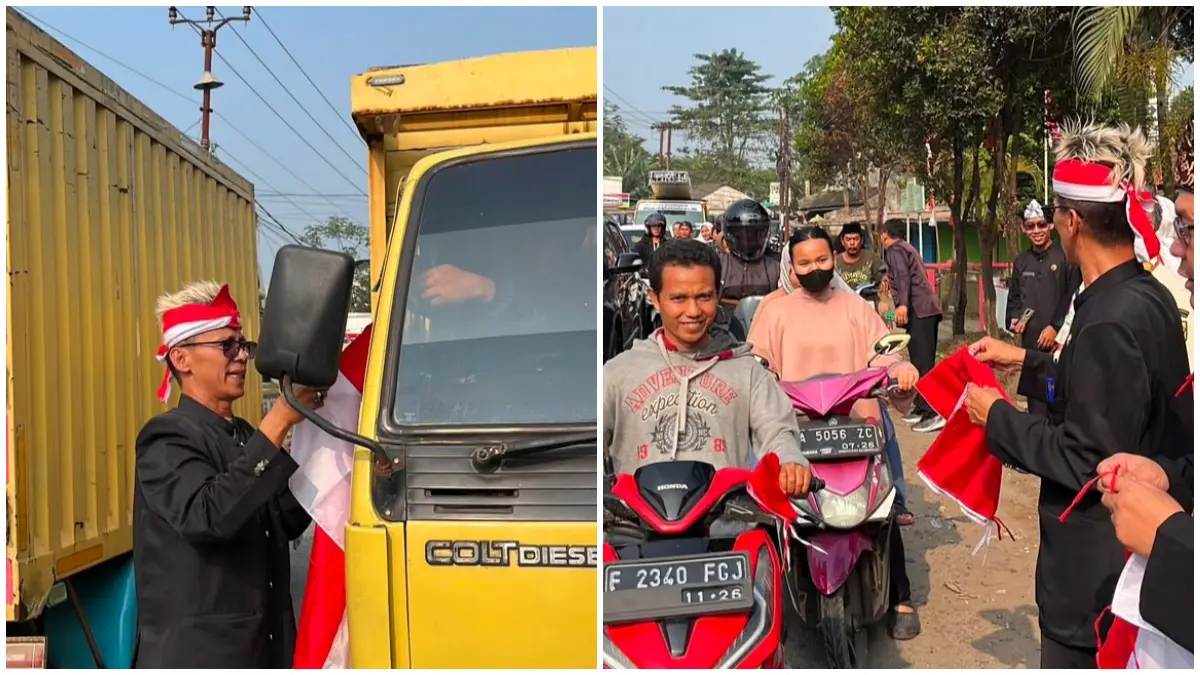 Camat Gunung Sindur saat membagikan bendera merah putih di Jalan Atma Asnawi, Gunung Sindur, menjelang HUT Ke-81 RI.
(Foto : camat)