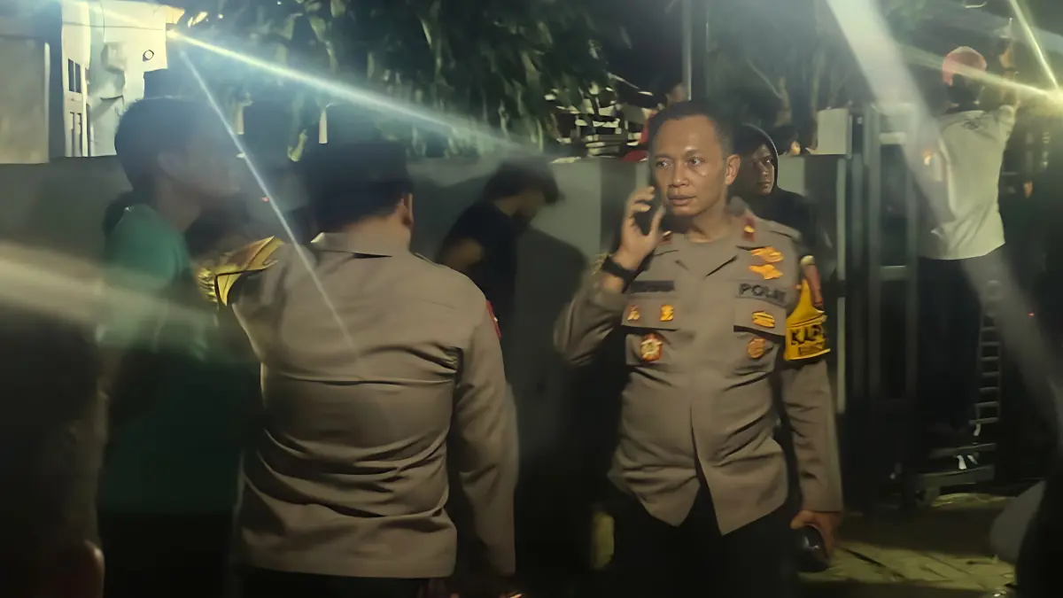 Polisi saat mengamankan lokasi.