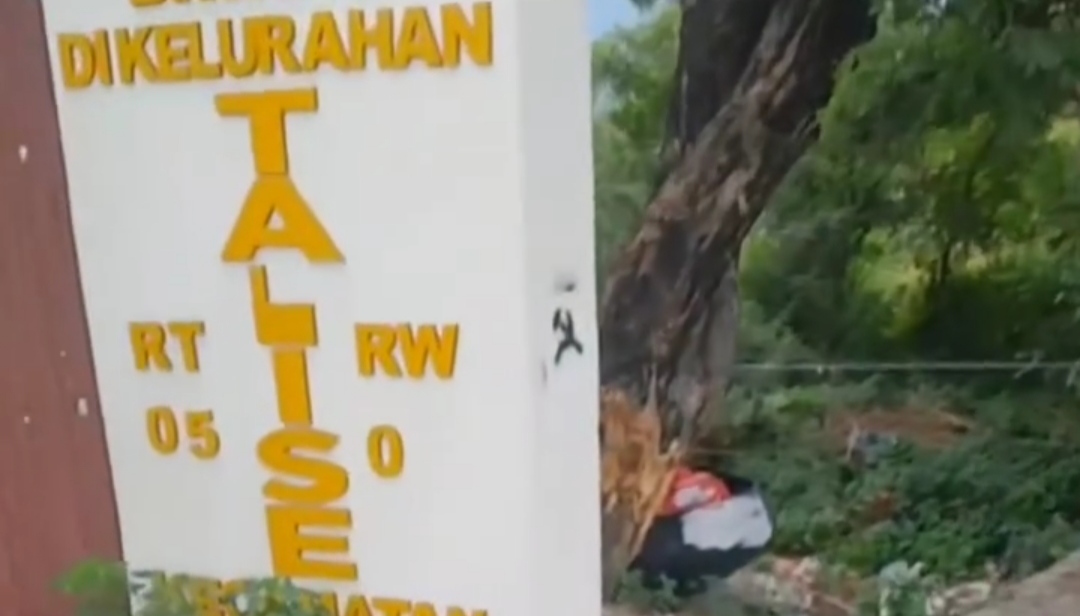 Simbol menyerupai palu arit terlihat di tembok perbatasan Kelurahan Tondo dan Talise, Kecamatan Mantikulore, Kota Palu.