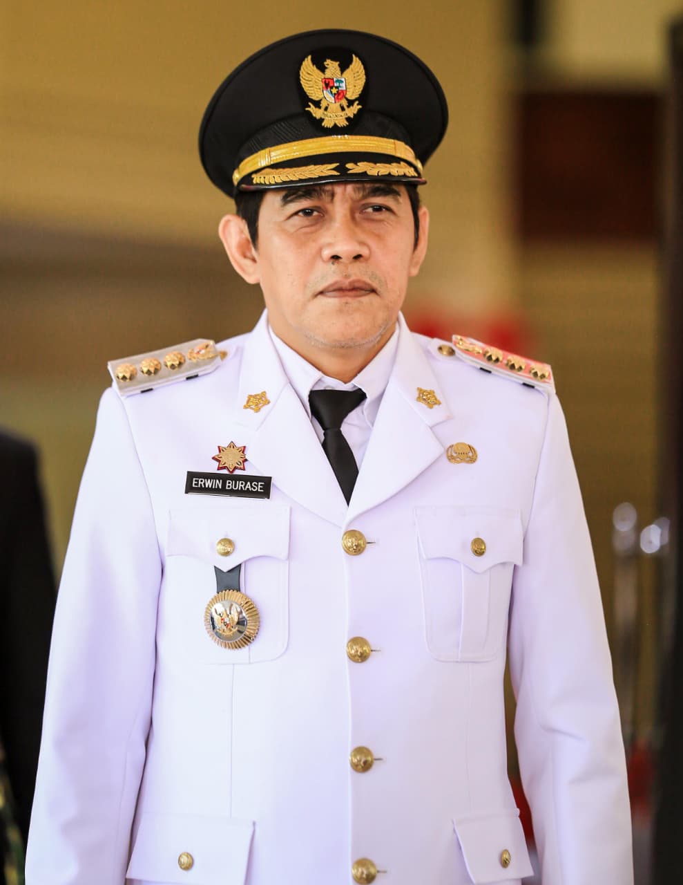 H. Erwin Burase (FOTO: ISTIMEWA/RADAR PALU).