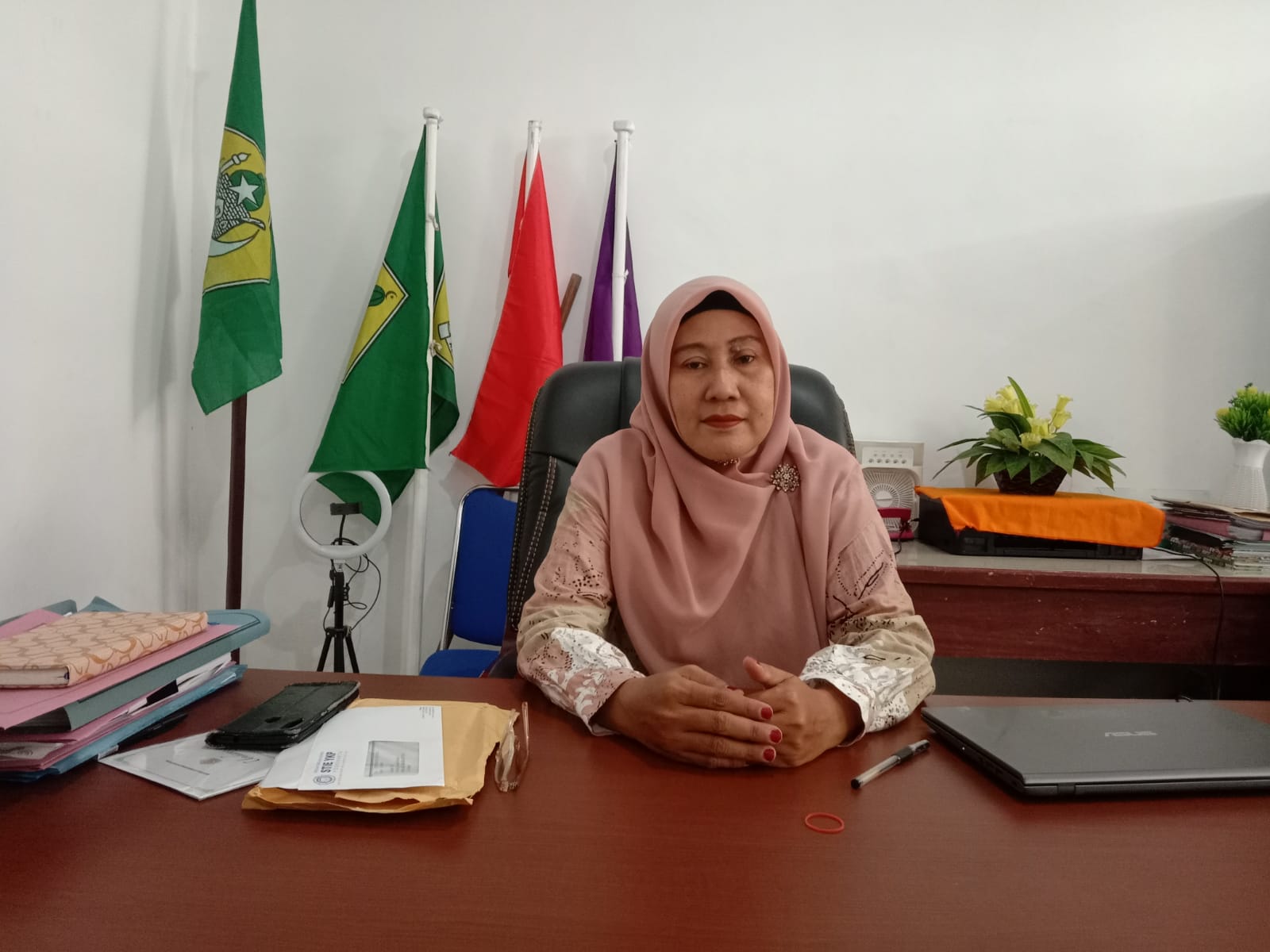 Kepala SMK Alkhairaat Palu, Awalia Ngkoyo
