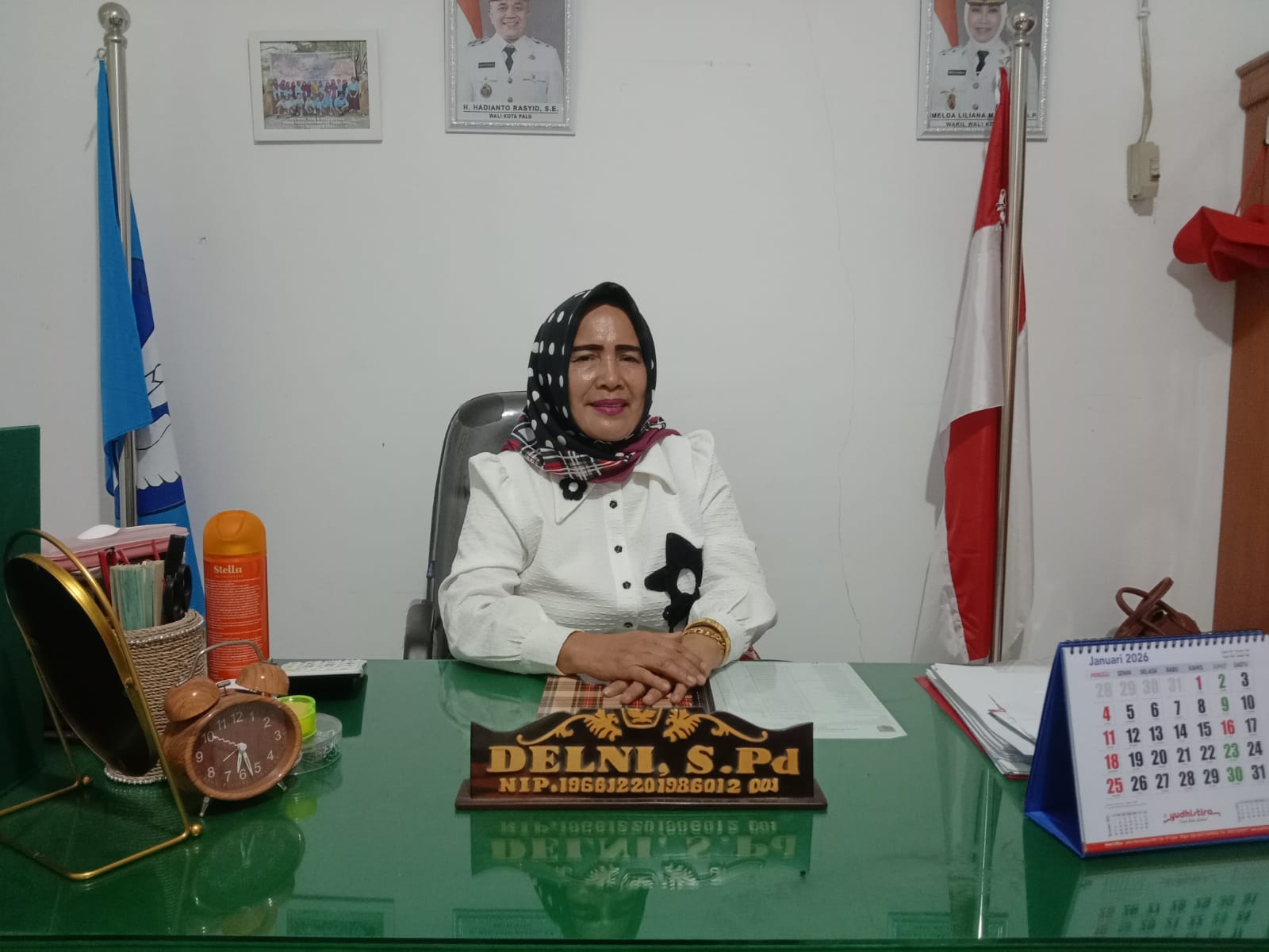 Kepala SD Inpres 3 Tatura Palu, Delni.