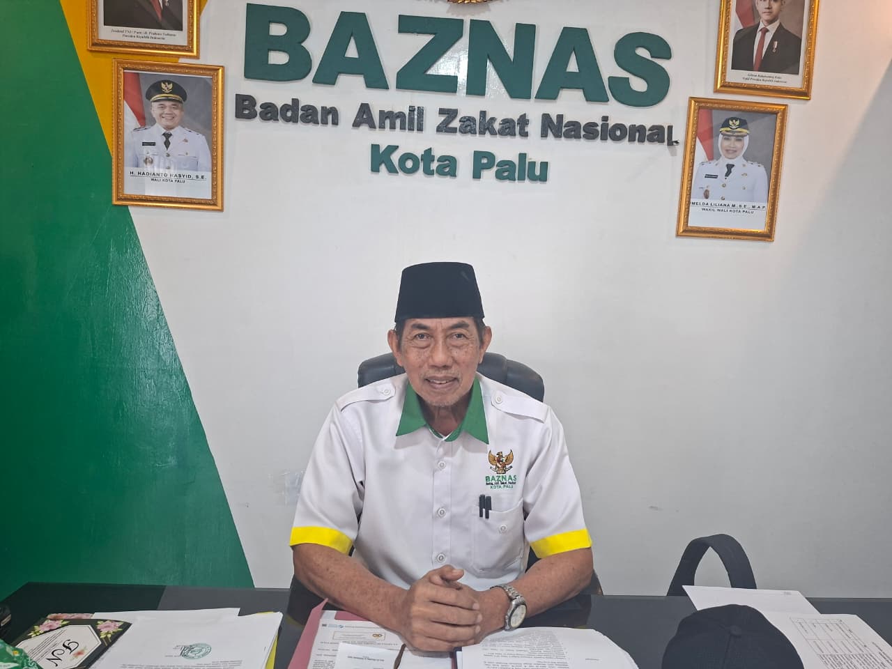 Ketua Baznas Kota Palu, Muchlis A. Mahmud, menjelaskan mekanisme pemotongan gaji guru untuk zakat mal kepada media, Selasa (3/2/2026).