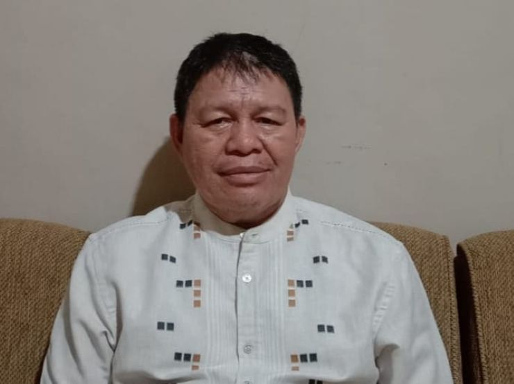 Kepala SD Negeri Model Terpadu Madani Palu, Hasan Mahmud, saat ditemui di ruang kerjanya.