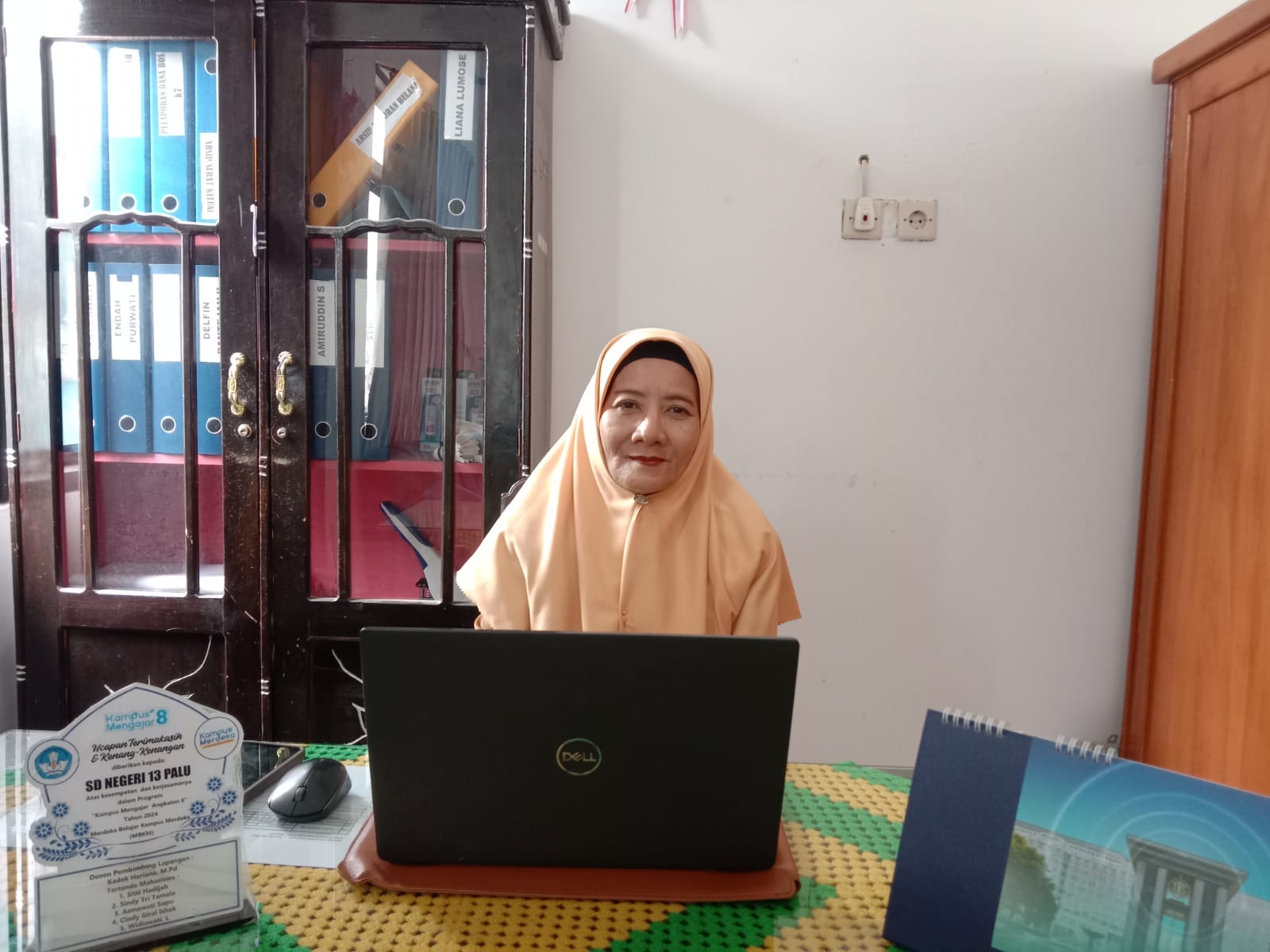 Kepala SDN 13 Palu, Ratnawati