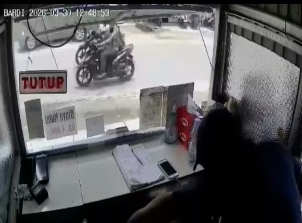 Rekaman CTTV di lokasi perampokan BRI Link di Jalan Veteran. 