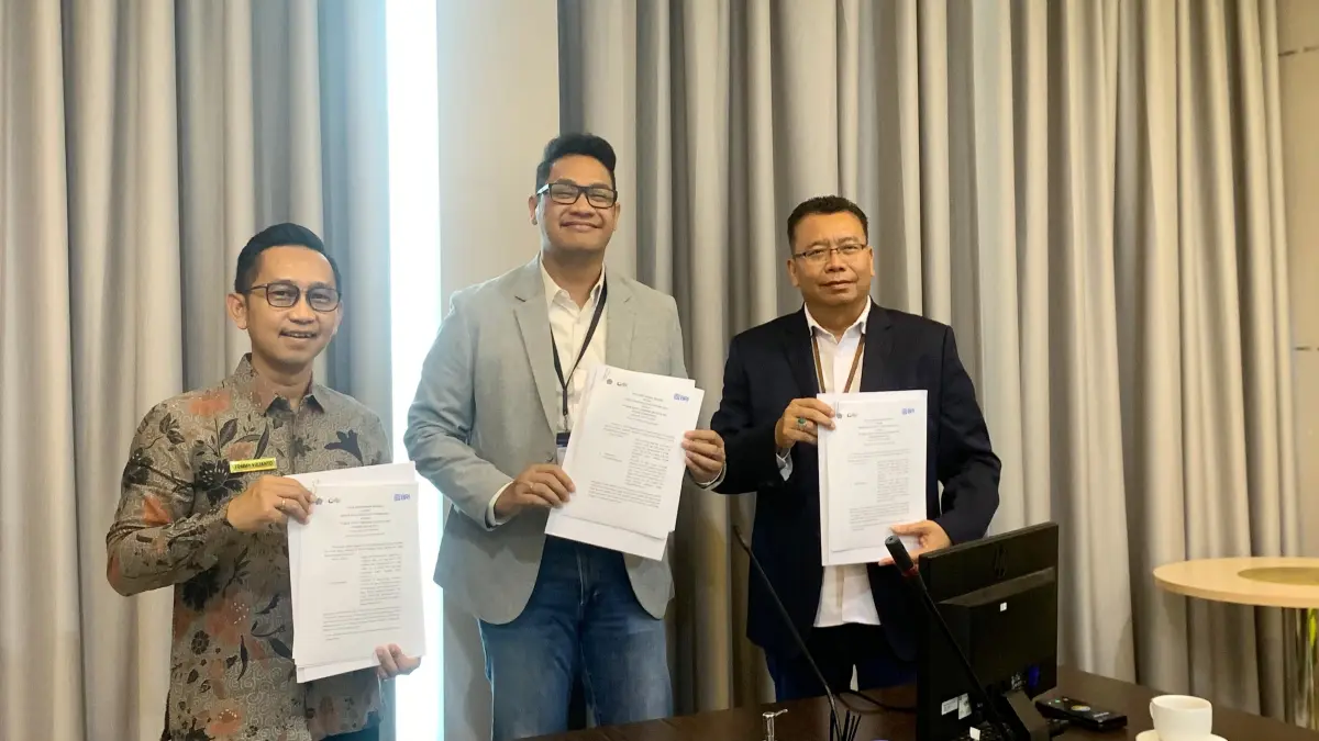 Penandatanganan MoU antara KPP Pratama Palu dengan BRI Cabang Palu terkait dengan lelang bersama.(RINA ABD HALIK)