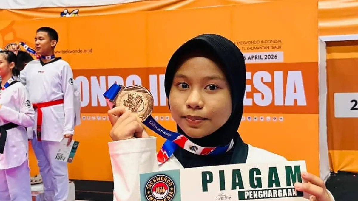 Indah Kirana, atlet taekwondo usia dini, sukses meraih medali perunggu pada ajang Kejuaraan Nasional (Kejurnas) Cadet Junior Samarinda 2026.(Dokumentasi Pribadi)
