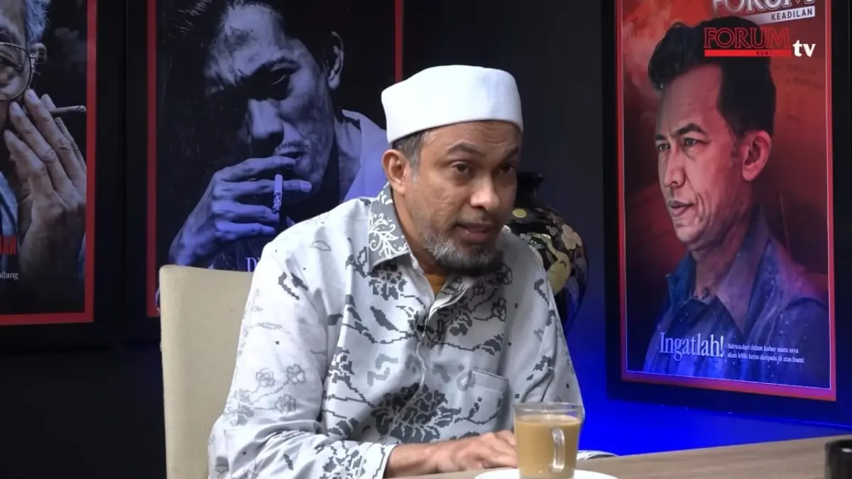Rafiq Al Amri terlapor kasus UU ITE. (Tangkapan Layar Video Podcast)