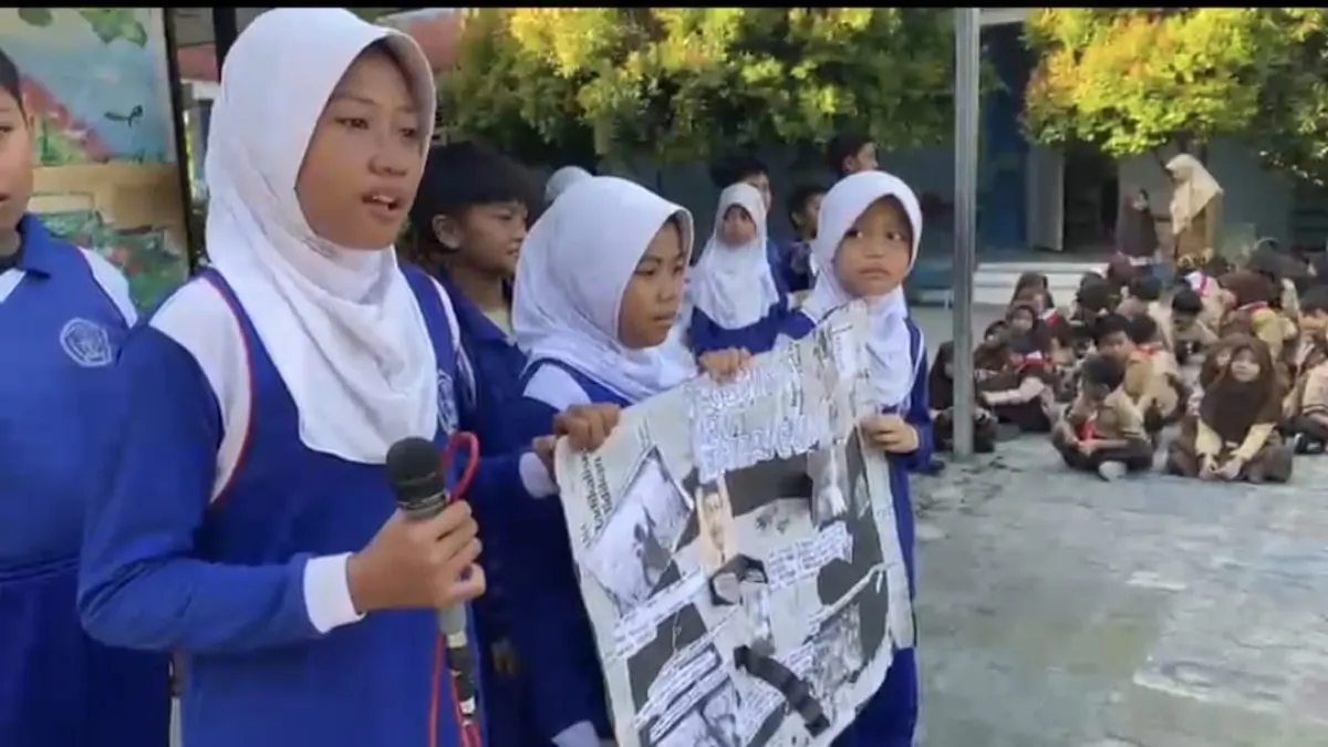 Siswa SDN 15 Palu mempresentasikan hasil bacaan dalam program SeRaSi yang kini berdampak pada peningkatan rapor pendidikan. (Istimewa)