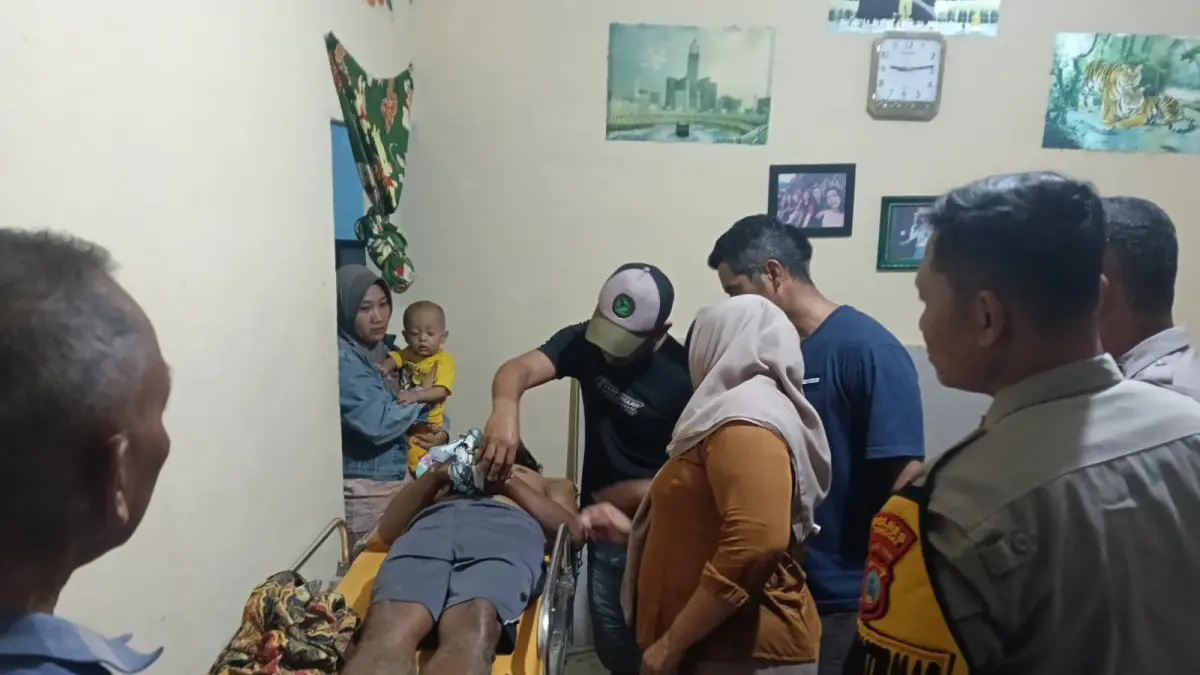 MENINGGAL: Seorang petani pria bernama Sudarto (55) ditemukan meninggal dunia di area persawahan miliknya pada Kamis malam (30/7/2026).(FOTO: NENDRA PRASETYA/RADAR PALU)