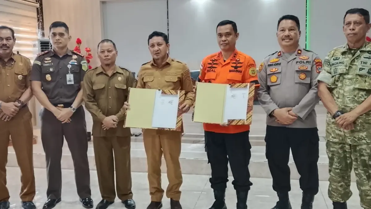 KERJASAMA: Pemkab Touna bersama KPP Palu, melakukan Penandatanganan Nota Kesepahaman yang berlangsung di, Ruang Rapat Kantor Bupati, Senin (10/8/2026).(FOTO: HERIYANTO LIMAHU/RADAR PALU).
