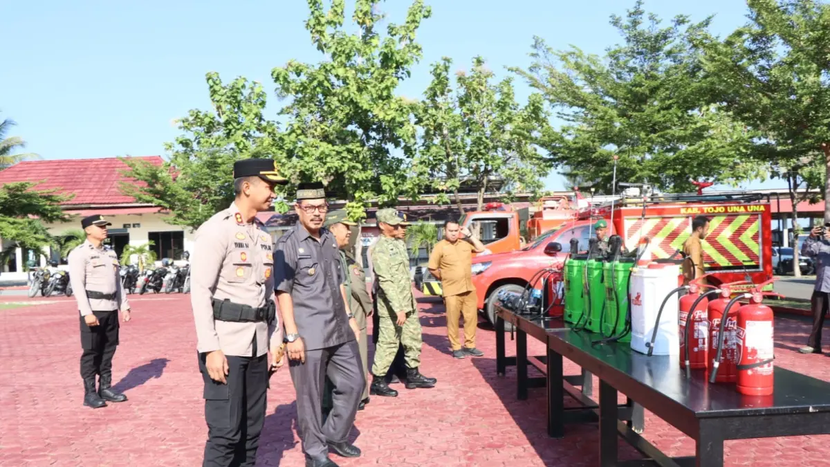 APEL: Kapolres Touna AKBP Yanna Djayawidya, usai memimpin apel waspada Karhutla di Kabupaten Touna.(FOTO: HERIYANTO LIMAHU/RADAR PALU).