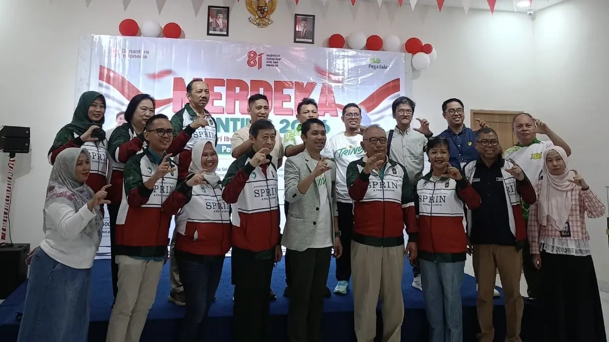 Foto bersama dalam program Merdeka Stunting 2026 yang digelar Pegadaian bersama POGI di Kota Palu, Sabtu (22/8/2026).(DOK: PEGADAIAN PALU).