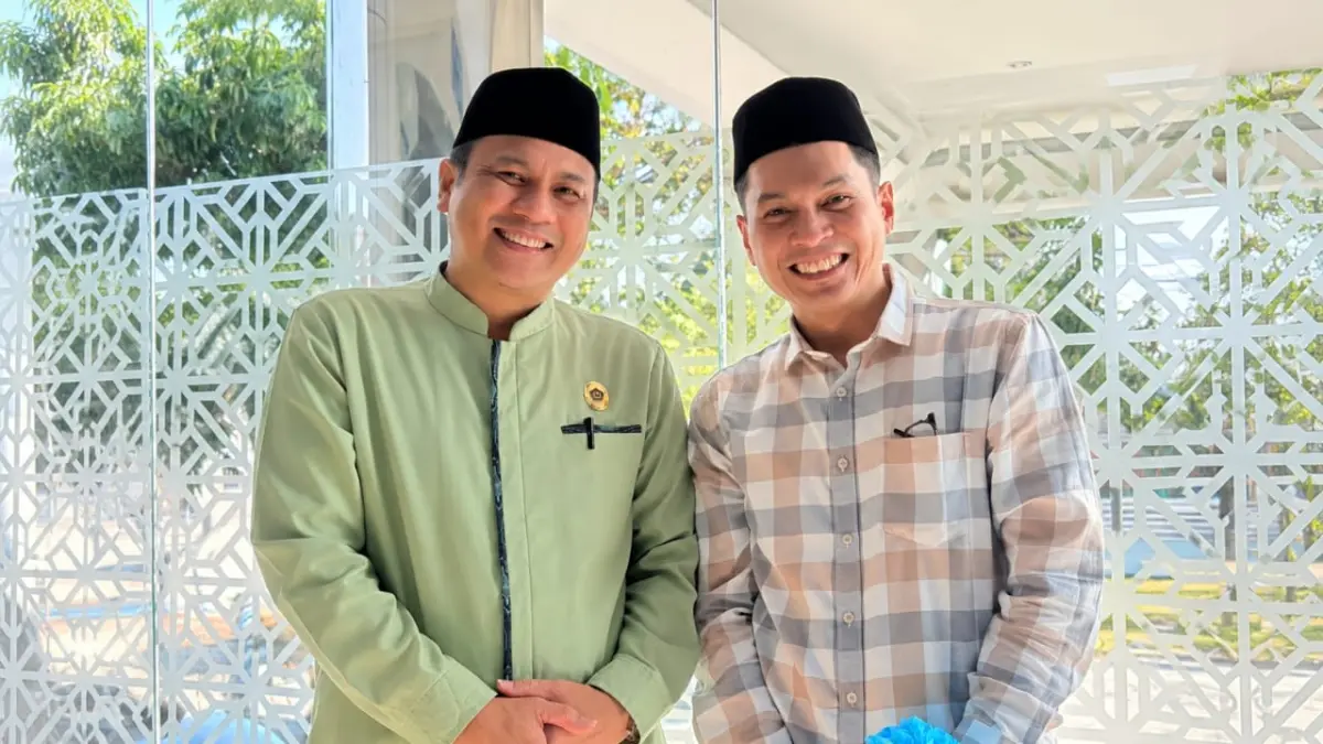 Kepala Kantor Kementerian Agama (Kemenag) Kabupaten Poso, H. Sutami M. Idris, M.Pd.I., bersama Pemimpin Cabang BRI  Poso, Jakananda Nofiar.