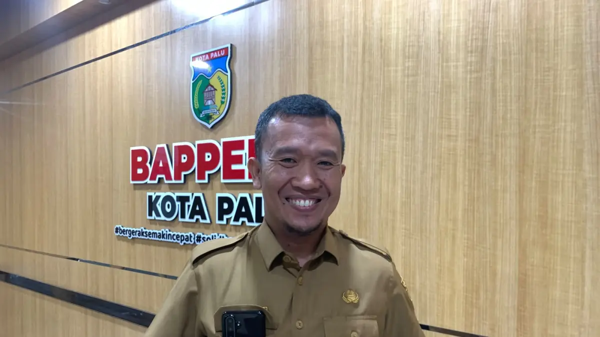 Asisten II Bidang Perekonomian dan Pembangunan Kota Palu, Rahmad Mustafa.(Rina/Radar Palu).