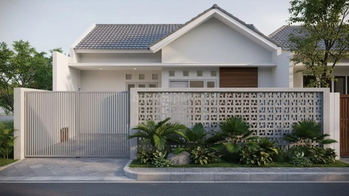 Pagar beton roster berongga dengan susunan pola berlubang yang memungkinkan sirkulasi udara tetap lancar sekaligus memberi tampilan modern pada rumah minimalis