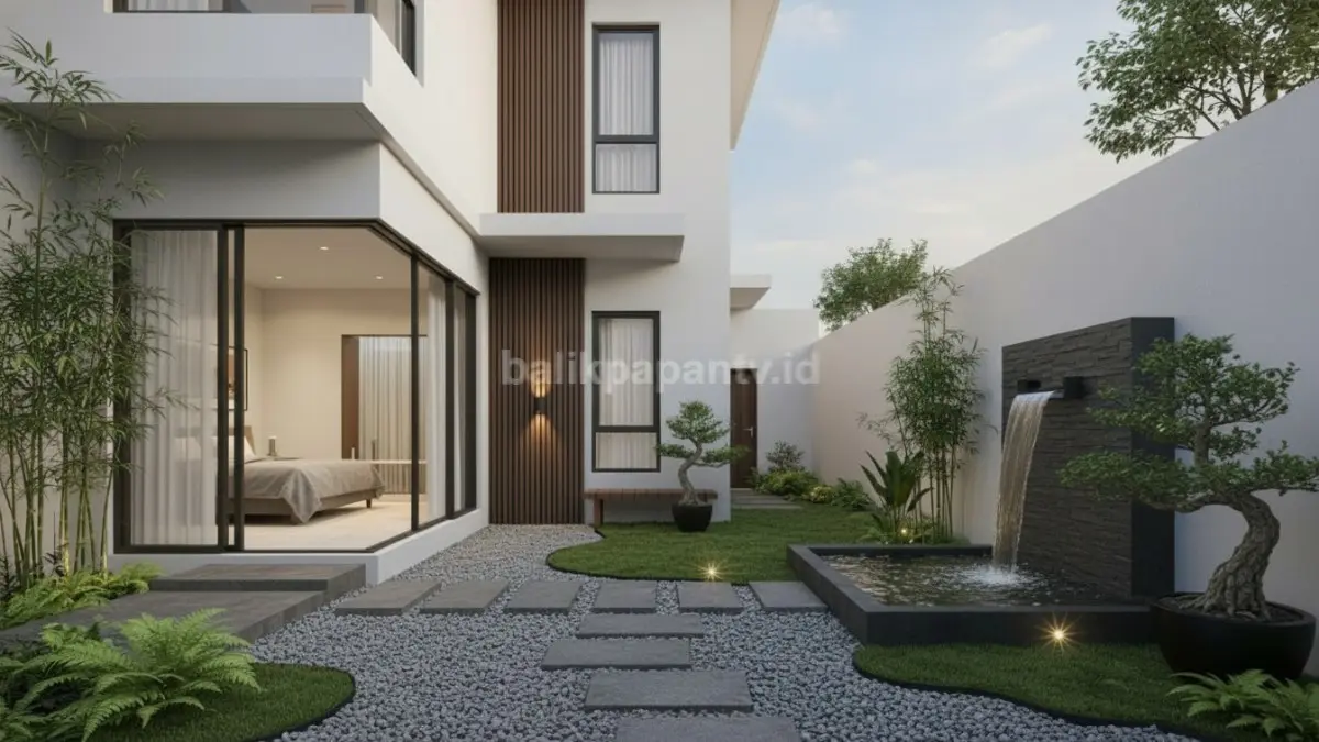 Private zen garden modern dengan batu alam dan tanaman hijau untuk area relaksasi rumah minimalis. (BTV/Ai)