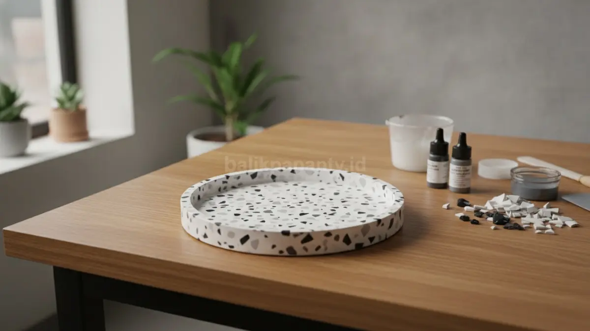 Terrazzo monokrom minimalis memadukan warna putih, hitam, dan abu-abu untuk tampilan bersih modern elegan.  (BTV/AI)