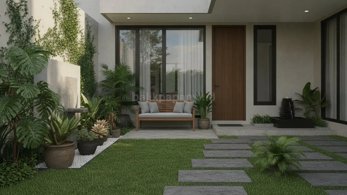 Taman depan rumah sederhana dengan desain minimalis modern dan tanaman tropis rapi. (BTV/Ai)