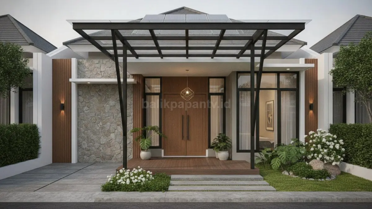 Model kanopi cantik dengan kombinasi kaca dan baja modern yang membuat fasad rumah tampil elegan.