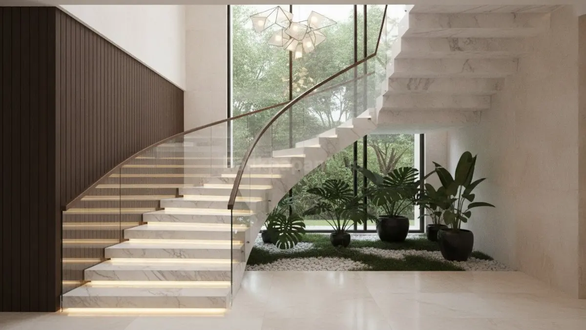 Tangga rumah mewah dengan marmer premium dan pencahayaan elegan yang menjadi pusat perhatian interior.