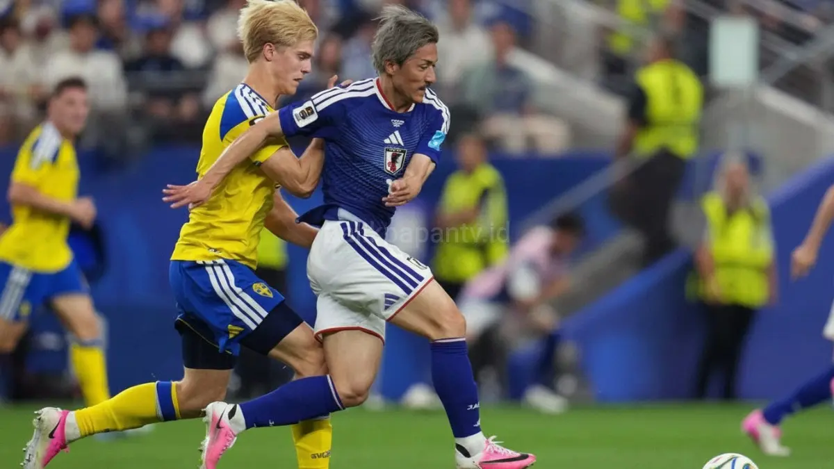 Jepang melaju ke babak gugur Piala Dunia 2026 usai bermain imbang menghadapi Swedia, hasil yang cukup mengamankan langkah mereka ke fase berikutnya dalam persaingan yang berlangsung ketat.(BTV/AI) 