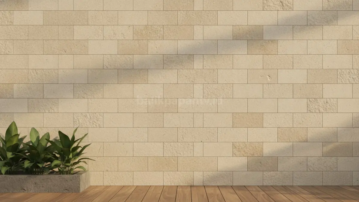 Gambar utama Dinding rumah minimalis dengan batu alam warna krem tampilan modern hangat natural  (BTV/AI)
  